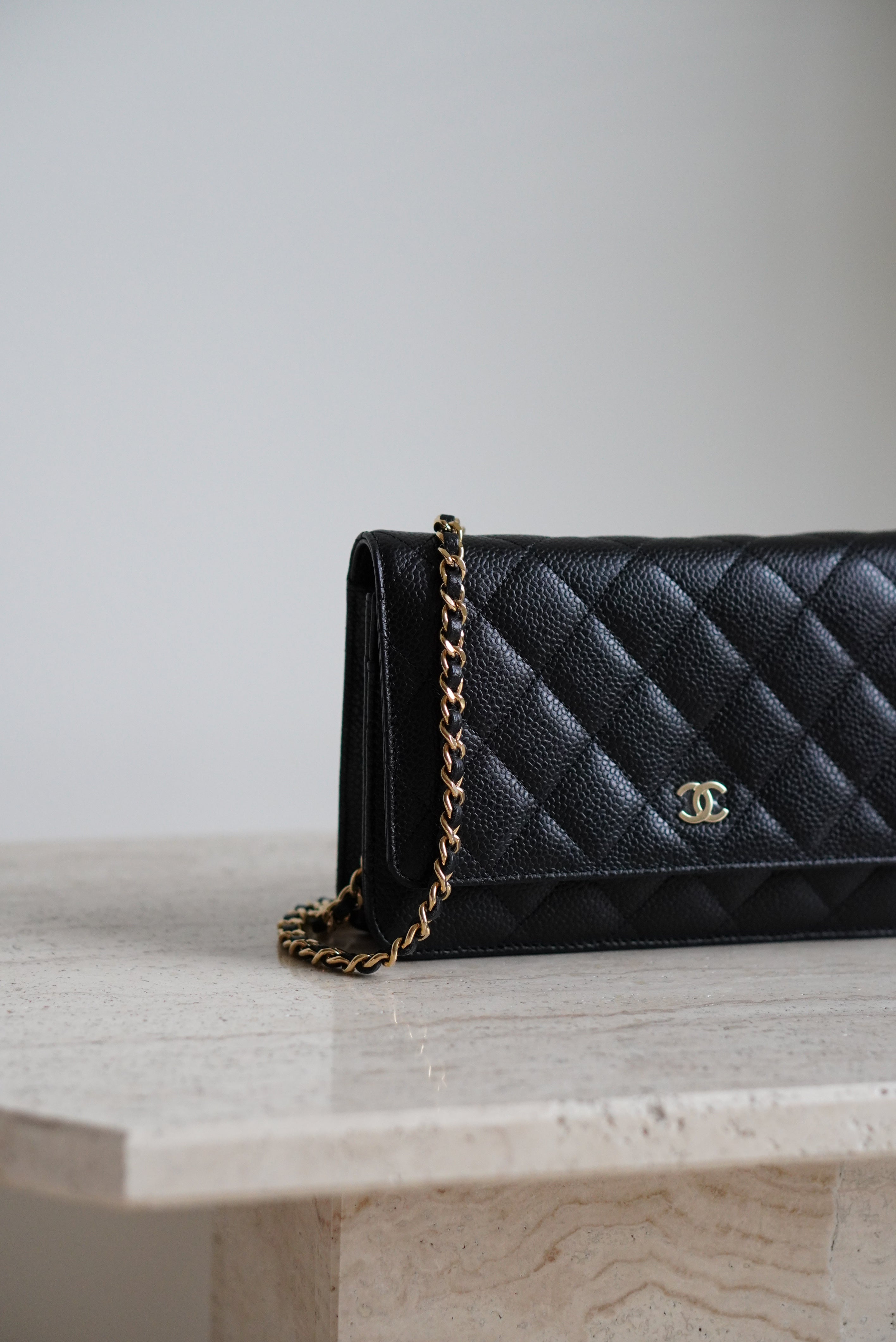 Chanel woc black caviar gold hardware hot sale