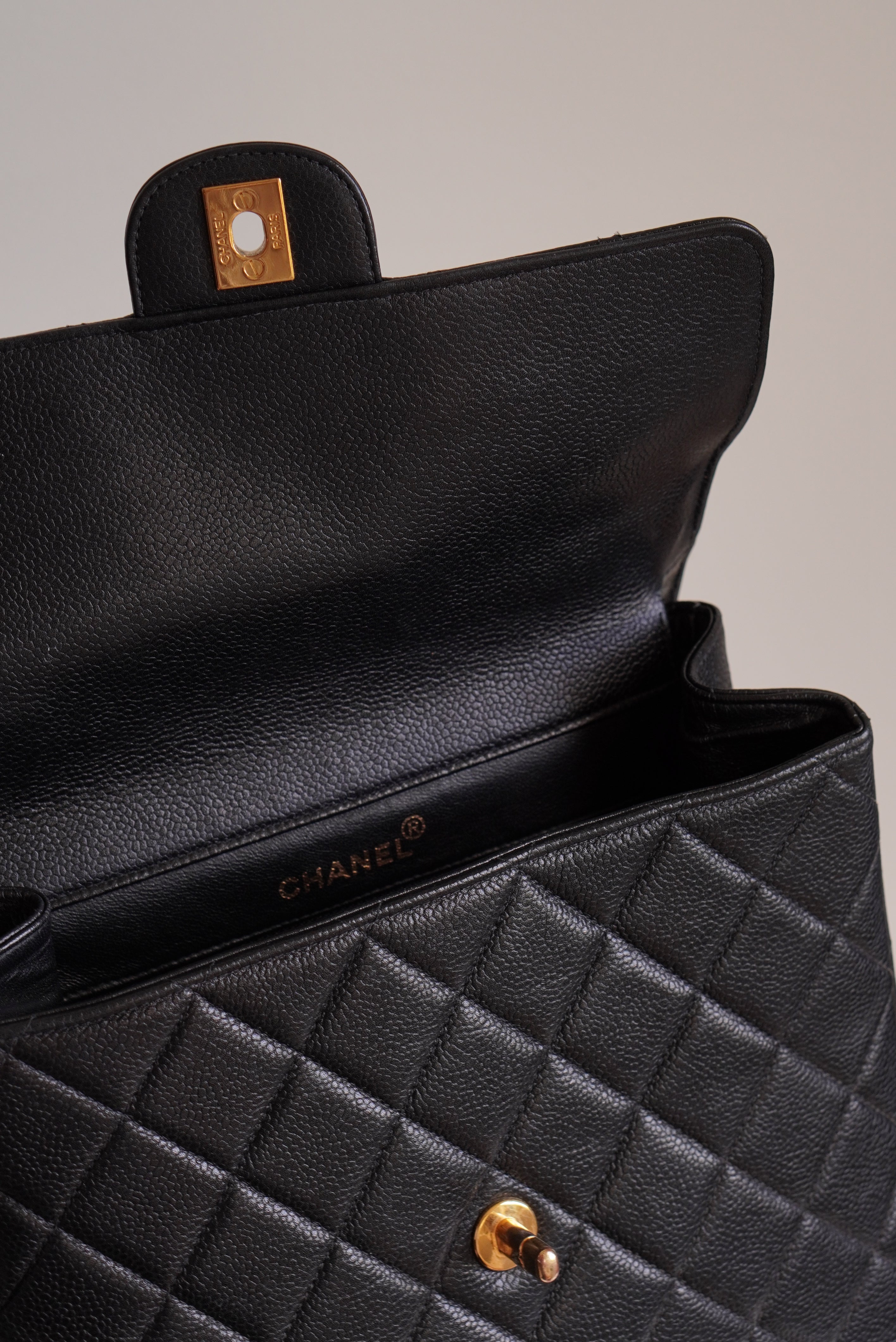 CHANEL CLASSIC JUMBO DOUBLE SIDED SINGLE FLAP | BLACK