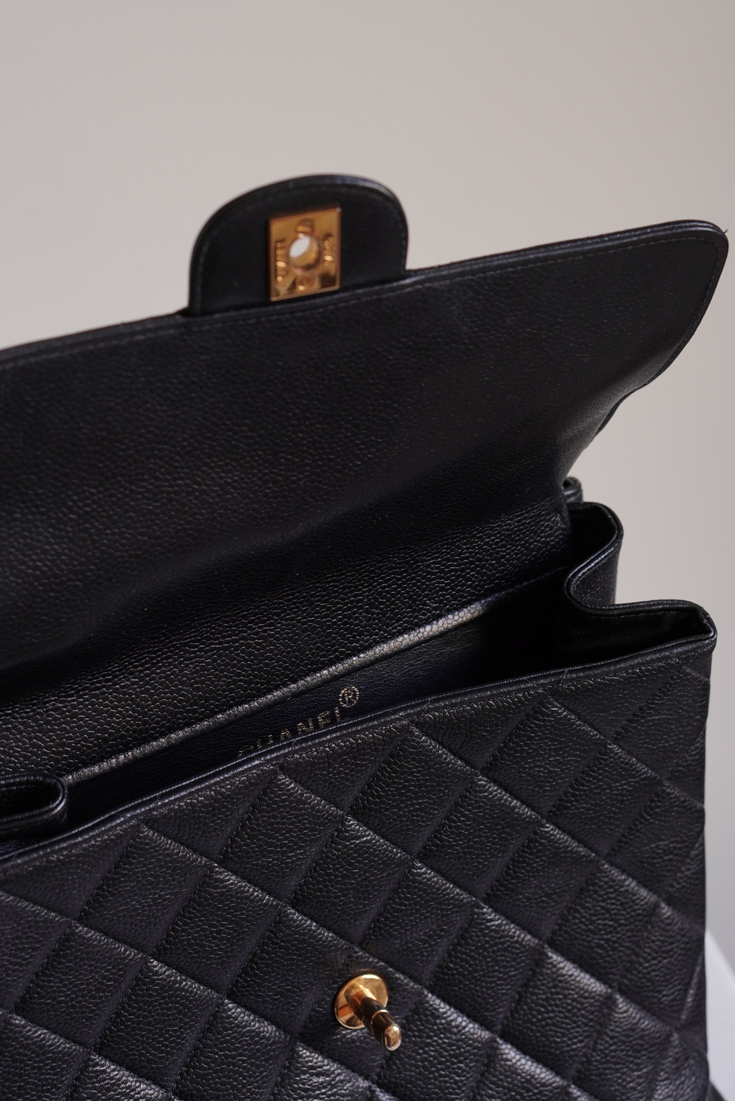 CHANEL CLASSIC JUMBO DOUBLE SIDED SINGLE FLAP | BLACK