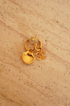 CHANEL EARRINGS ASYMMETRICAL SHELL A23 C