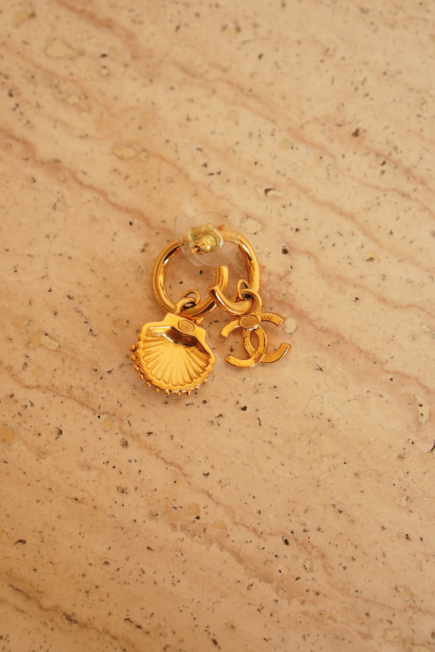 CHANEL EARRINGS ASYMMETRICAL SHELL A23 C