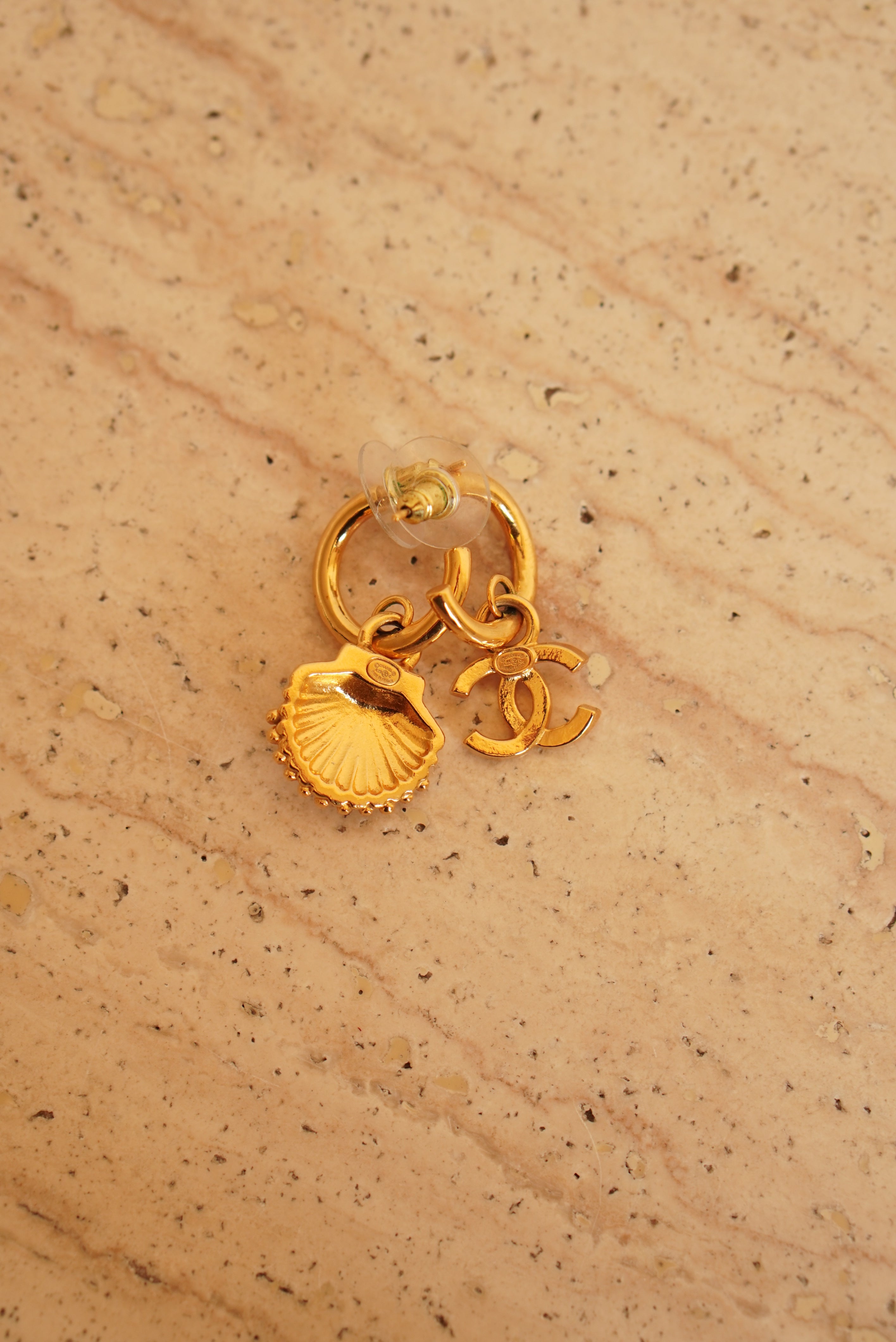 CHANEL EARRINGS ASYMMETRICAL SHELL A23 C