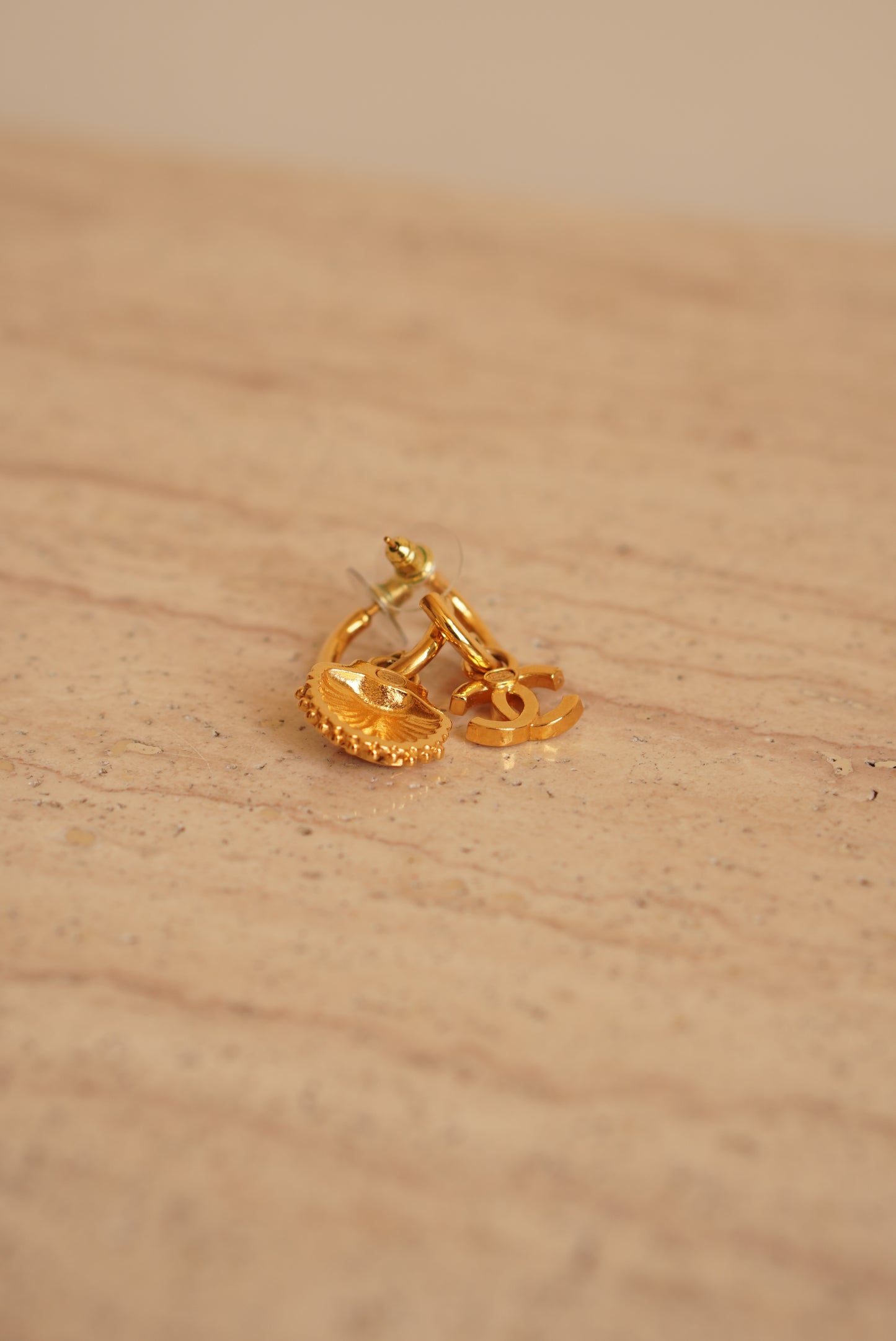CHANEL EARRINGS ASYMMETRICAL SHELL A23 C