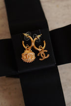 CHANEL EARRINGS ASYMMETRICAL SHELL A23 C