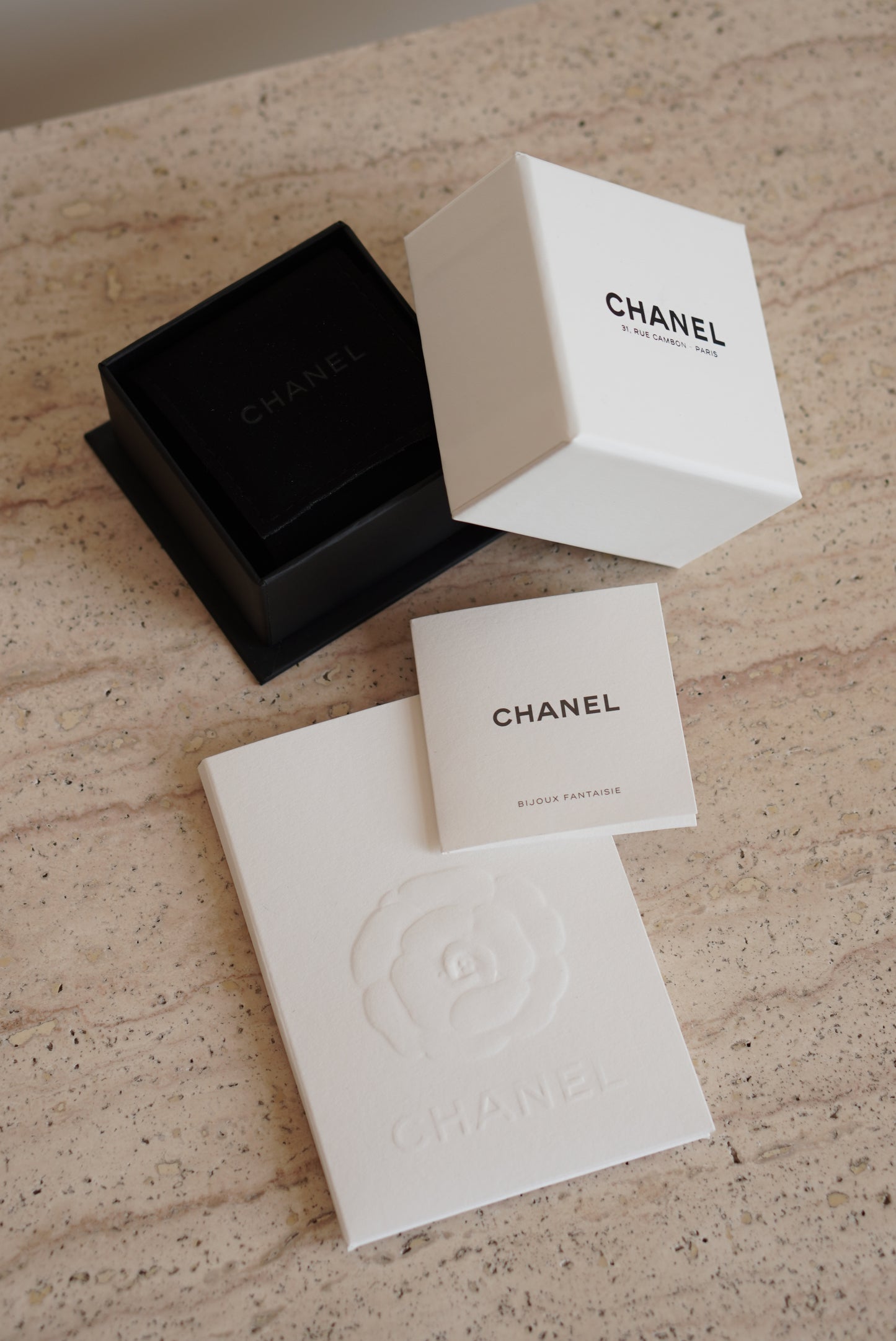 CHANEL EARRINGS ASYMMETRICAL SHELL A23 C