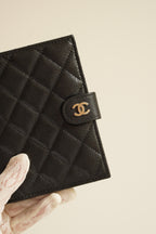 CHANEL 25S PASSPORT HOLDER | BLACK
