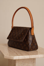 LOUIS VUITTON LOOPING PM