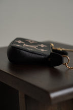LOUIS VUITTON MINI POCHETTE ACCESSOIRES