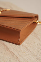 SAINT LAURENT CASSANDRE ENVELOPE CHAIN WALLET
